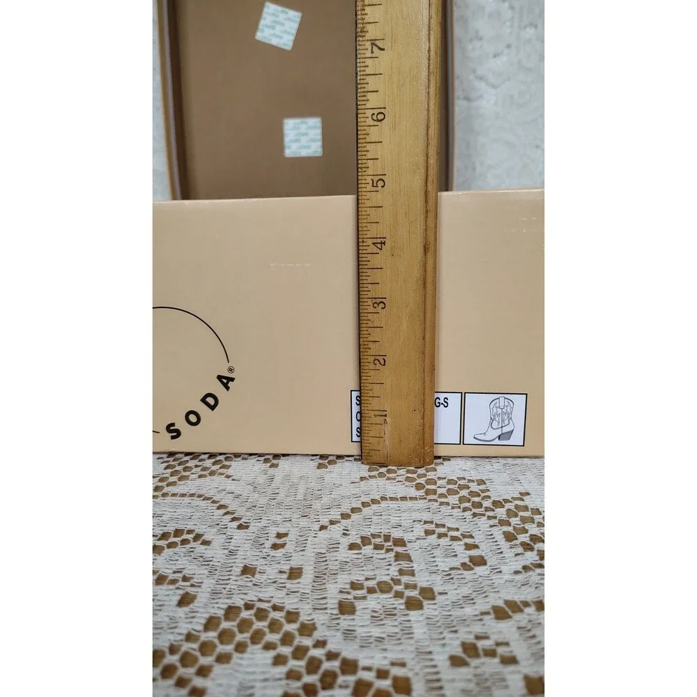 Empty shoe box from Soda with Styrofoam Shoe Inserts